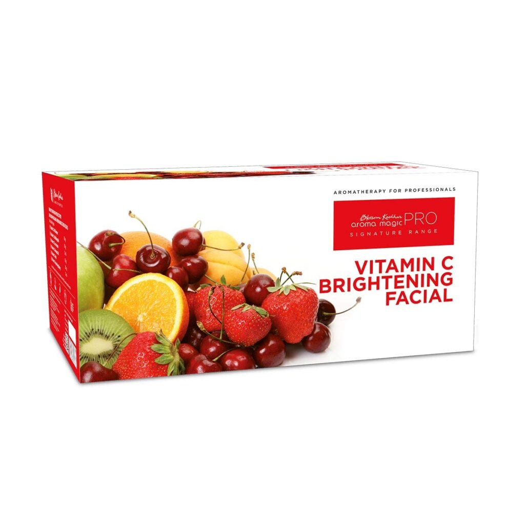 Packaging box of Aromatherapy for Professionals Vitamin C Brightening Facial with images of cherries, bananas, kiwi slices, and strawberries.